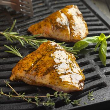 Grilled chicken or fish fillets with fresh rosemary and thyme, marinated to perfection for use with AVO Lafiness Mediterranean Marinade 4kg from Parkers Food Machinery Plus products.