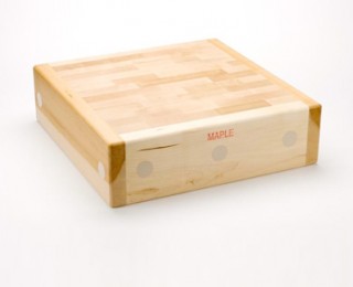 Reversible sectional butcher block made from laminated maple with reinforced edges – durable food-safe cutting surface for professional meat preparation