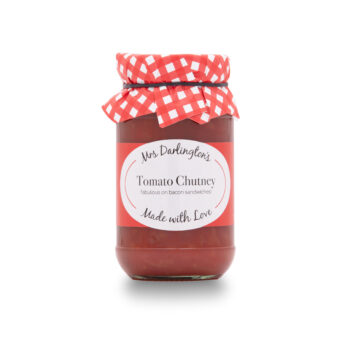 A glass jar of Mrs Darlington's Tomato Chutney with a red label and checkered fabric lid, a Fabulous on bacon sandwiches and made with love from Parkers Food Machinery Plus.