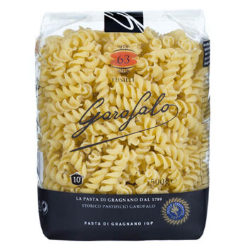 Garofalo fusilli pasta in transparent packaging with Pasta di Gragnano IGP seal, showcasing spiral-shaped noodles and premium Italian branding