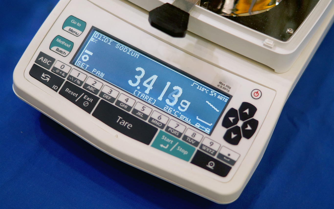 Digital weighing scale for food processing with touchscreen display, temperature indicators, and multifunctional keypad