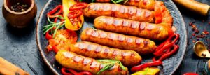 Platter of grilled festive sausages made with Leonard’s Santa’s Sleigh-er sausage mix from Parkers Food Machinery Plus.