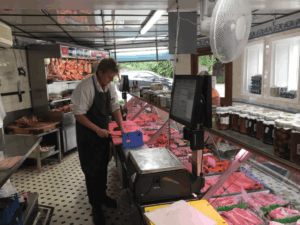 Traditional butchers shop counter with fresh meat display and Grupo Epelsa weighing scale from Parkers Food Machinery Plus.