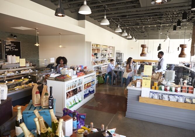 Interior Of Busy Delicatessen With Customers